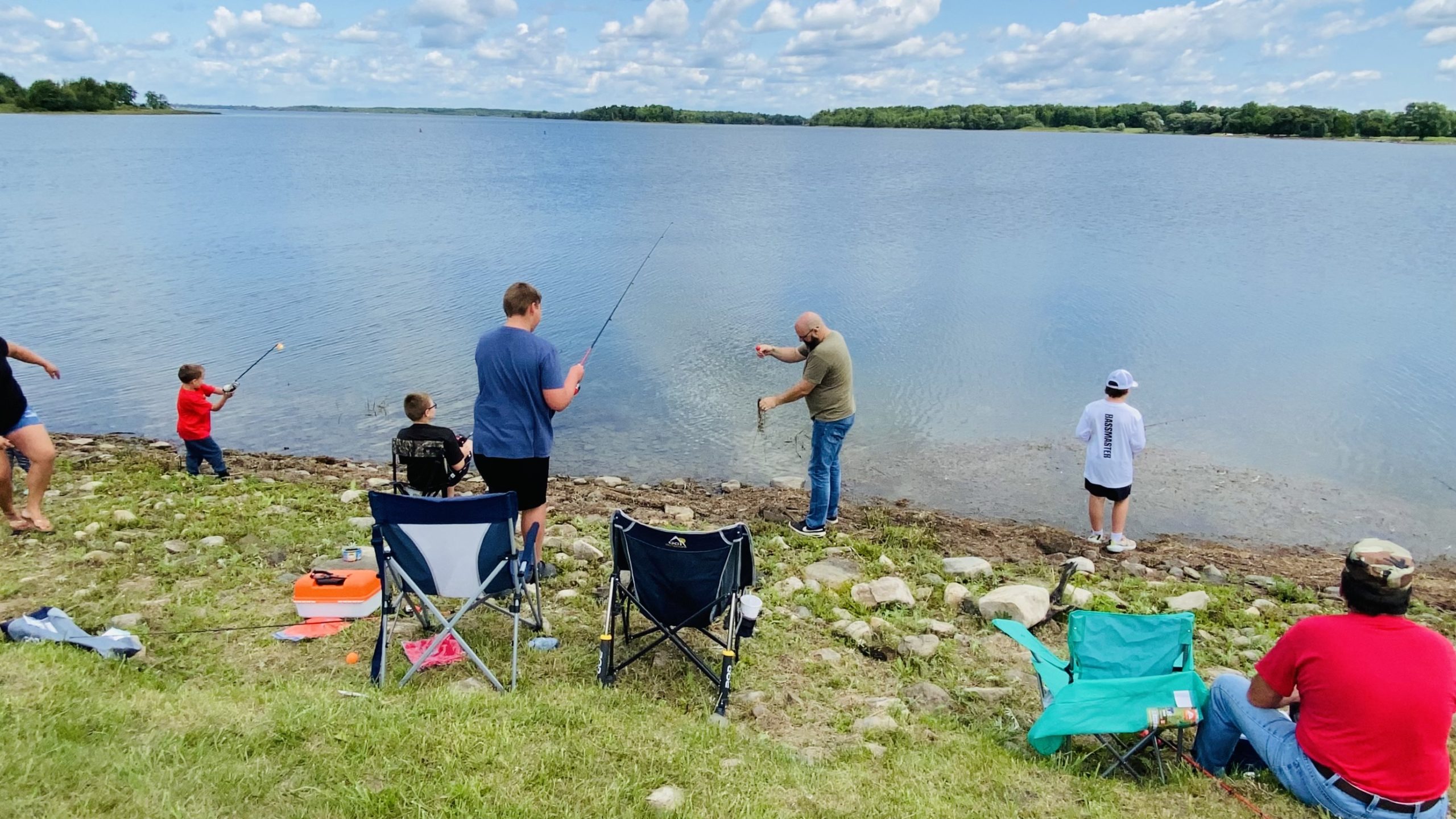 Family fishing during Kids Fishing Derby 2022
