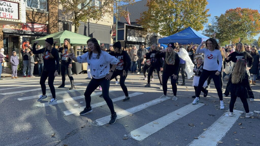 A flash mob dances on Main Street during Fall Fest: Pumpkinpalooza