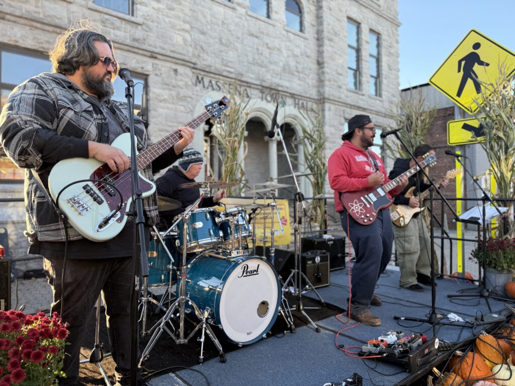 A band performs on the Fall Fest stage in front of Massena Town Hall